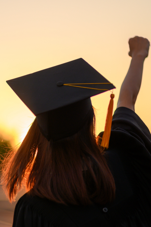 Student with fist in the air